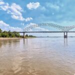 The Hernando de Soto Bridge arching over the Mississippi at Memphis, seen from the river