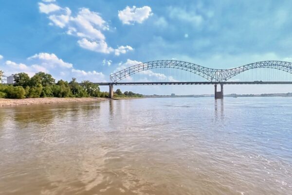 The Hernando de Soto Bridge arching over the Mississippi at Memphis, seen from the river