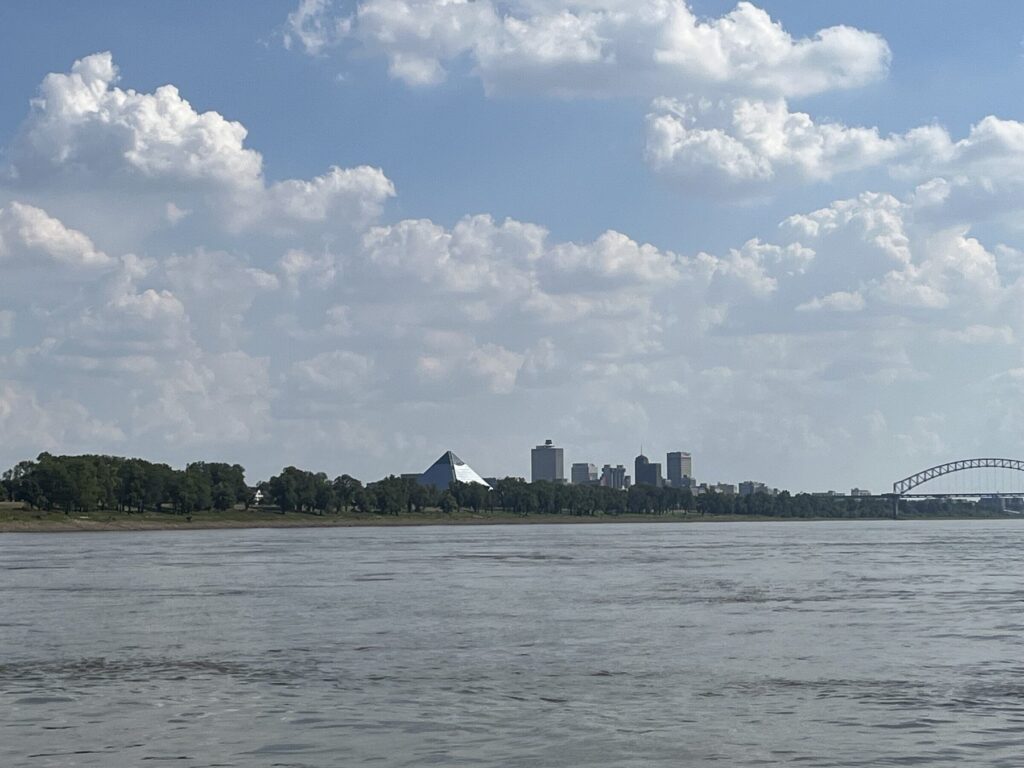 The Memphis skyline with the Pyramid and the Hernando de Soto Bridge, seen from a boat on the Mississippi